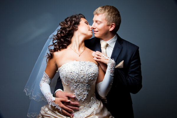 Kissing bride and groom