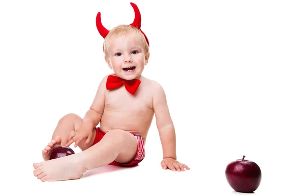 Kind im roten Anzug des verführerischen Teufels — Stockfoto