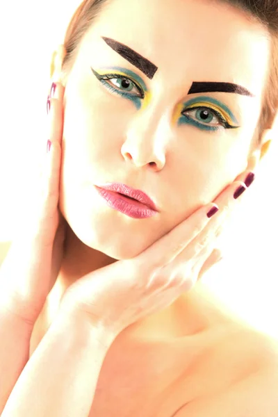 Schöne Frau mit Make-up Stockbild