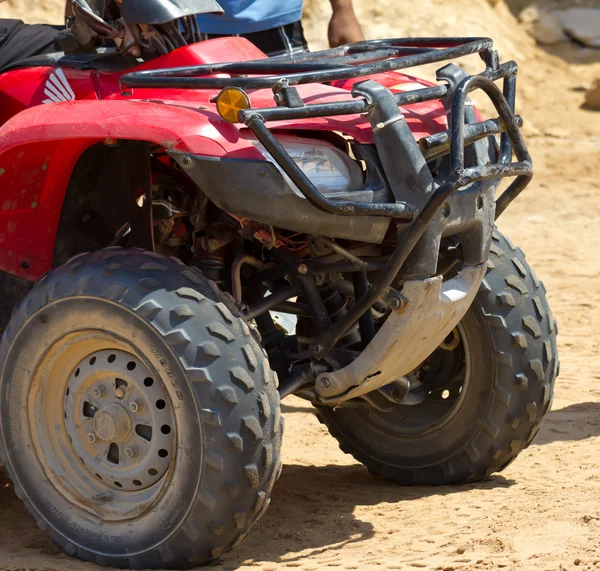 stock image Red quad bike in the desert.