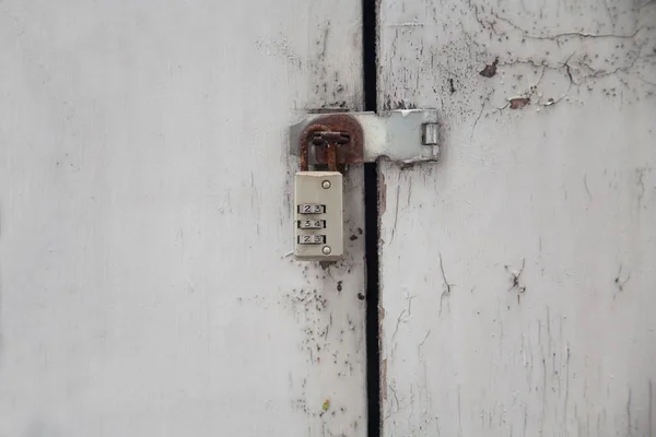 Locked door with key — Stock Photo, Image
