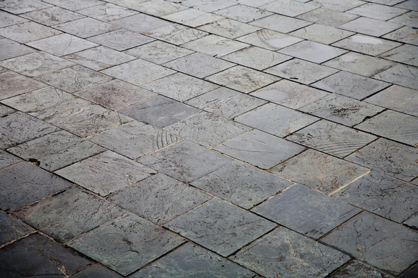 Weathered concrete floor bricks — Stock Photo, Image