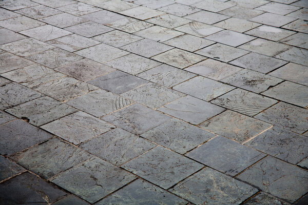 Weathered concrete marble floor bricks