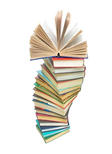 A large stack of books on white background — Stock Photo, Image