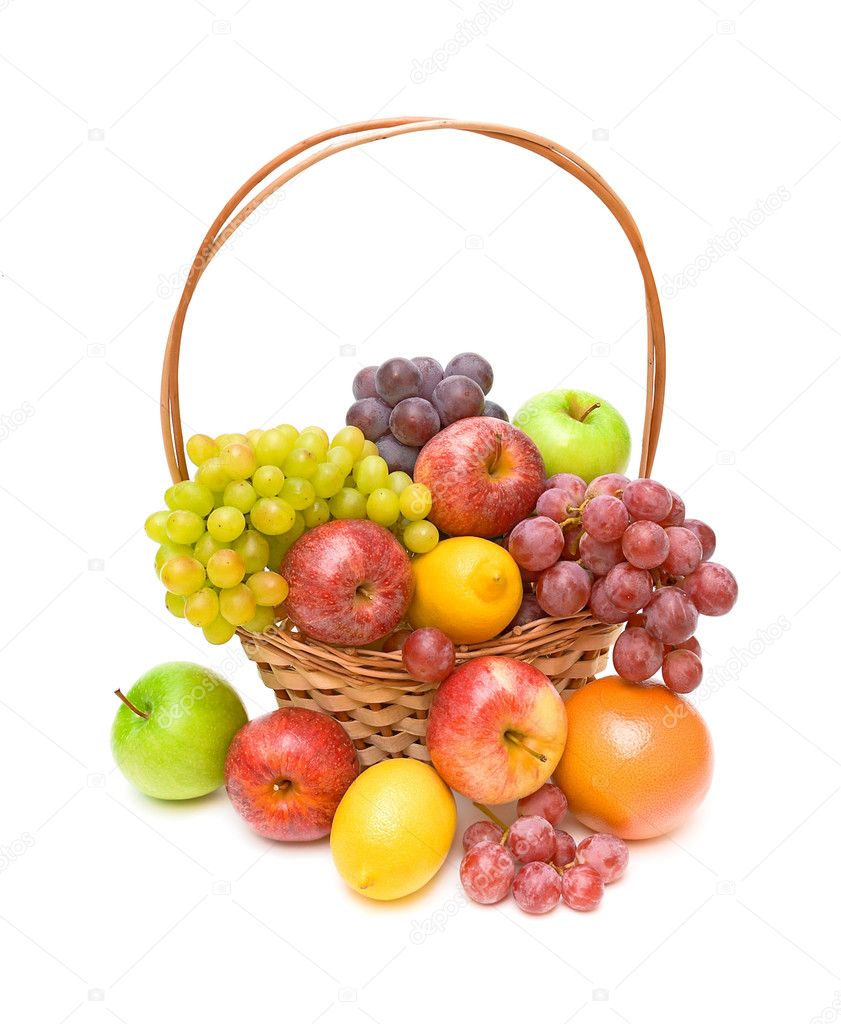Set fruit in a wicker basket on a white background