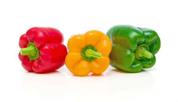 Three pepper closeup on white background — Stock Photo, Image