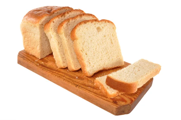 Bread lays on a board — Stock Photo, Image