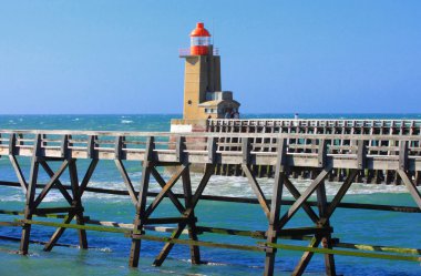 Entrance channel of the Port of Fecamp in Normandy france clipart