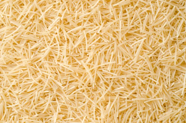 Vermicelli as background — Stock Photo, Image