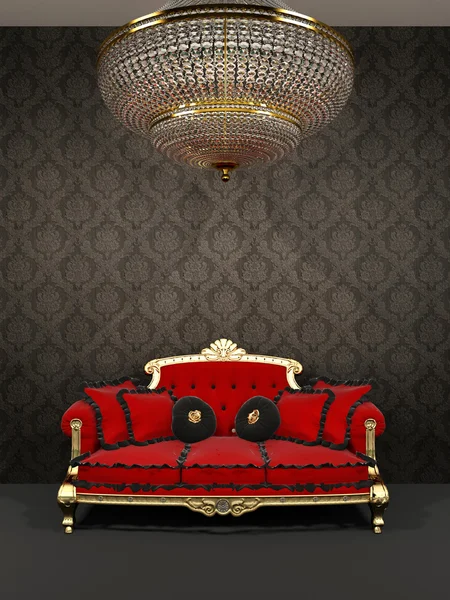 Red sofa and chandelier in royal interior — Stock Photo, Image