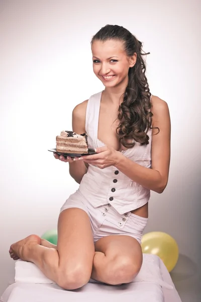 Cake and girl — Stock Photo, Image