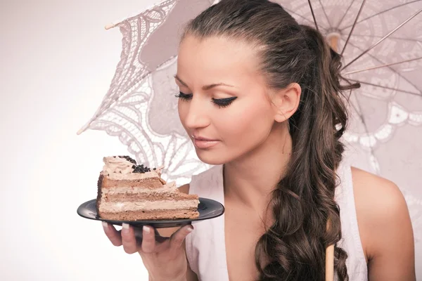 Cake and girl — Stock Photo, Image