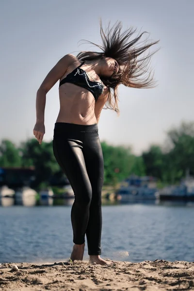 Acrobatic girl — Stock Photo, Image
