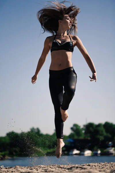 Acrobatic girl — Stock Photo, Image