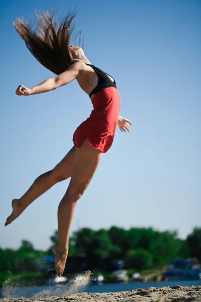 Menina acrobática — Fotografia de Stock