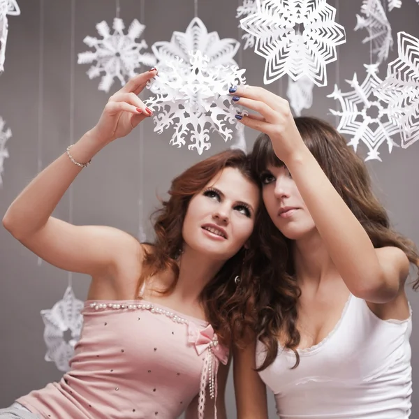 Girls and snowflakes — Stock Photo, Image