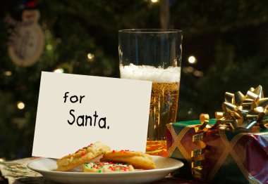 Children left beer and cookies for Santa. clipart