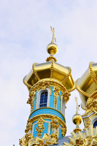 Golden dome of Catherine Palace church on the sky background