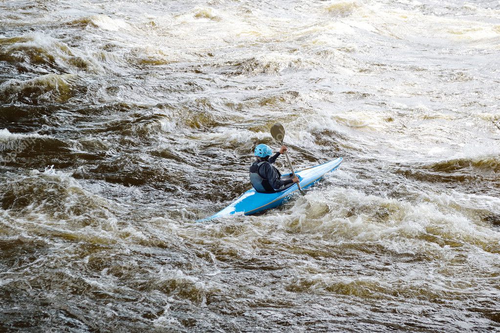 Kayaker on river Vuoksi