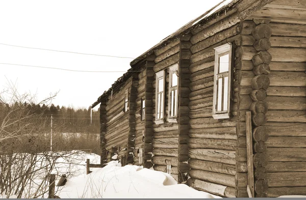 Fragment van huis in Russische dorp. Sepia. — Stockfoto