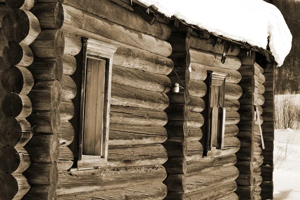 Fragment of house in Russian village. Sepia. — Stock Photo, Image