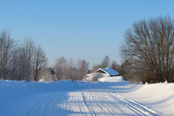 Δρόμο καλυμμένο χειμώνα χιόνι — Φωτογραφία Αρχείου