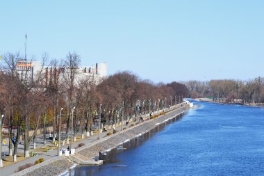 Embankment of the river Ping on a sunny spring day clipart