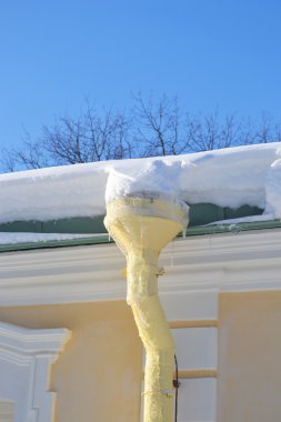 Downspout at winter clipart