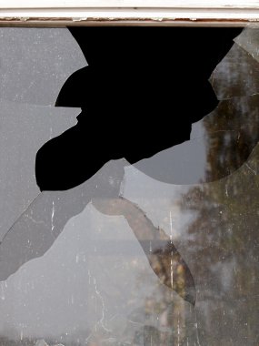 Glass broken on black background clipart