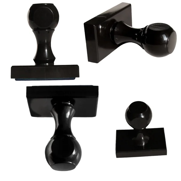 Zwarte houten stempels geïsoleerd op een witte achtergrond (met exemplaar ruimte instellen) — Stockfoto