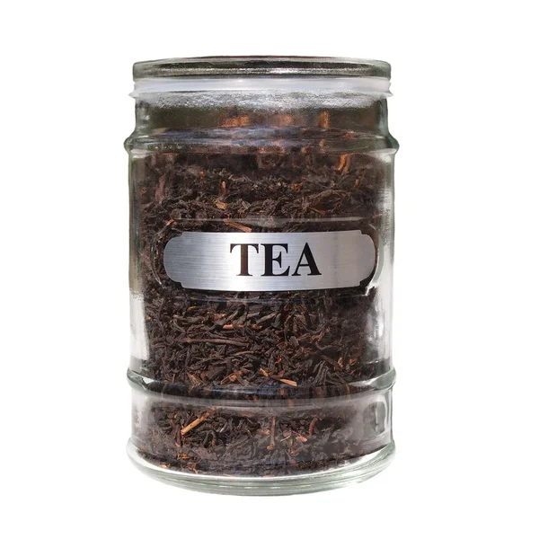 Svart te i glasburk isolerad på vitt — Stockfoto