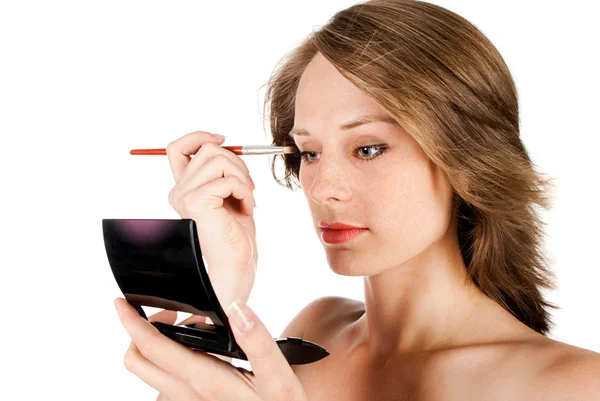 Woman face with brush — Stock Photo, Image