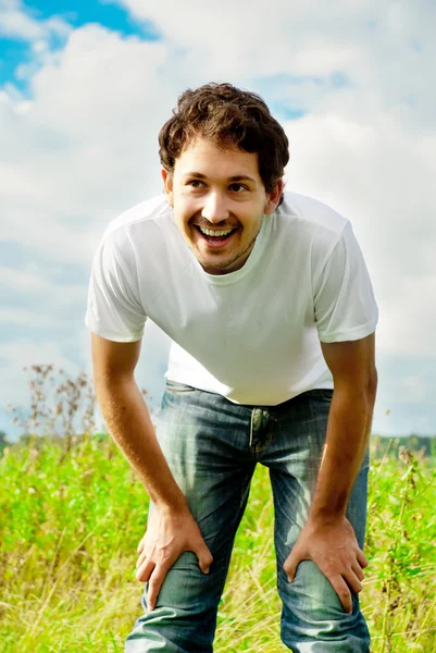 Man standing in a field — Stock Photo, Image