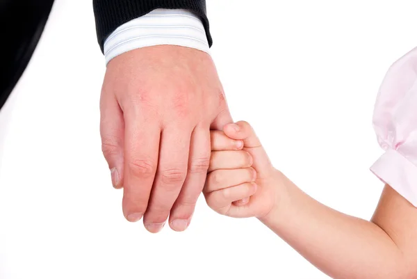 Criança segura a mão de seu pai — Fotografia de Stock