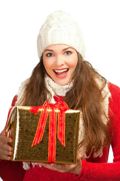 Beautiful woman holding christmas present — Stockfoto