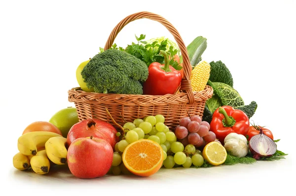 Composition with vegetables and fruits in wicker basket isolated — Stock Photo, Image