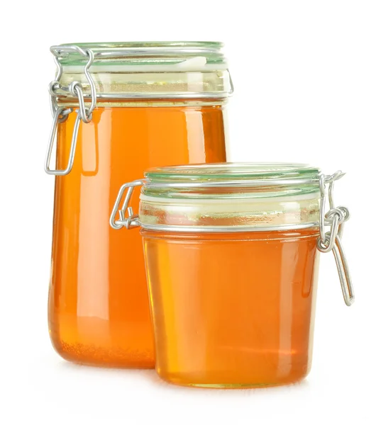 Jars of honey isolated on white — Stock Photo, Image