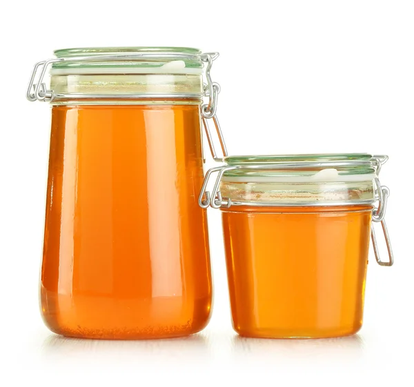 Potten van honing geïsoleerd op wit — Stockfoto