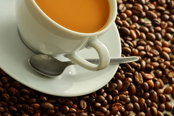 stock image Composition with cup and coffee beans