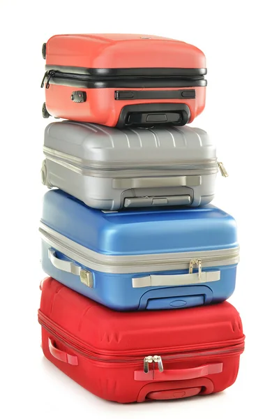 Bagages constitués de valises en polycarbonate isolées sur fond blanc — Photo