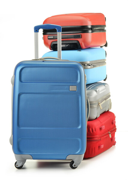 Luggage consisting of polycarbonate suitcases isolated on white