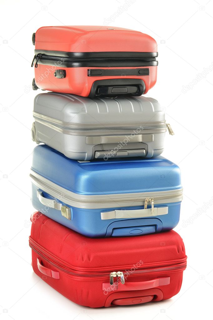 Luggage consisting of polycarbonate suitcases isolated on white