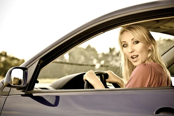 Beautiful blonde girl driver — Stock Photo, Image