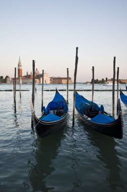 Venice gondolas at sunset clipart