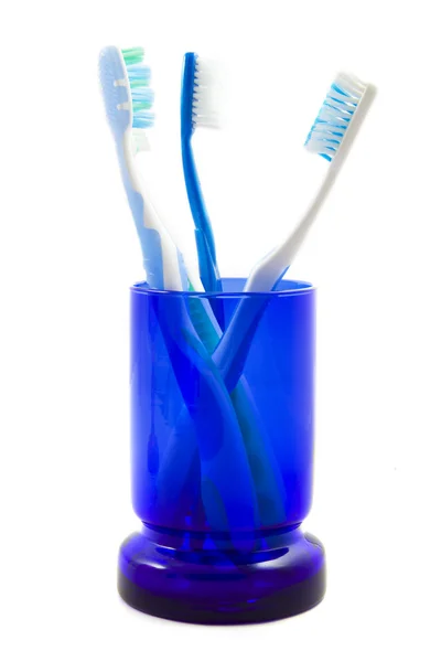 Glas med tandborstar — Stockfoto