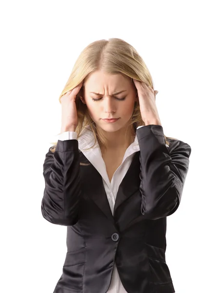Mujer joven que sufre un dolor de cabeza sobre fondo blanco —  Fotos de Stock