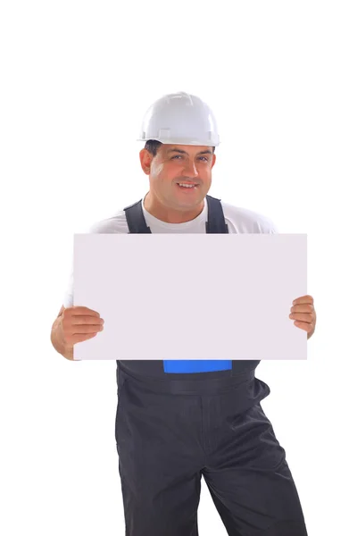 Mladý pohledný dodavatel drží transparent. izolované na bílém pozadí — Stock fotografie