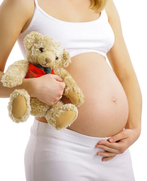 Těhotná žena touchgin její břicho — Stock fotografie