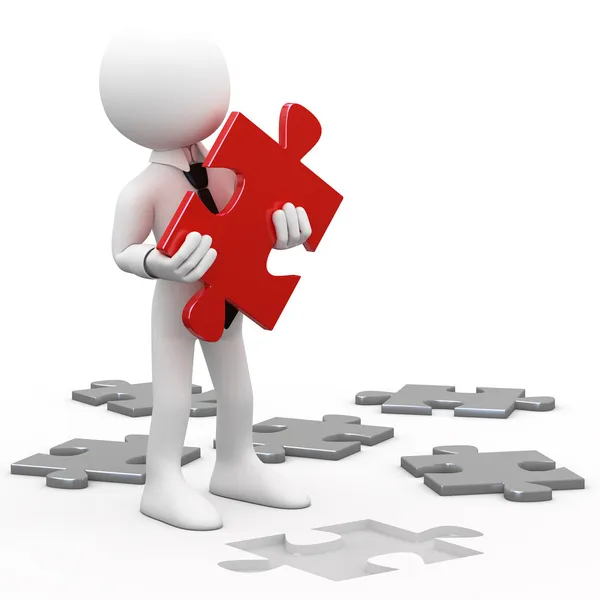 Man with a red puzzle piece in hand — Stock Photo, Image