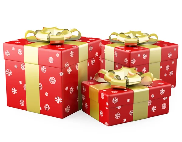 Τρεις κόκκινο δώρα Χριστουγέννων με ένα χρυσό κορδέλα — Φωτογραφία Αρχείου